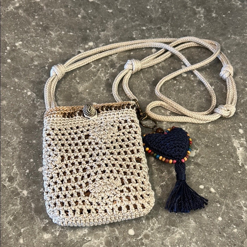 The Sak Cream Crochet Crossbody Bag with Tassel